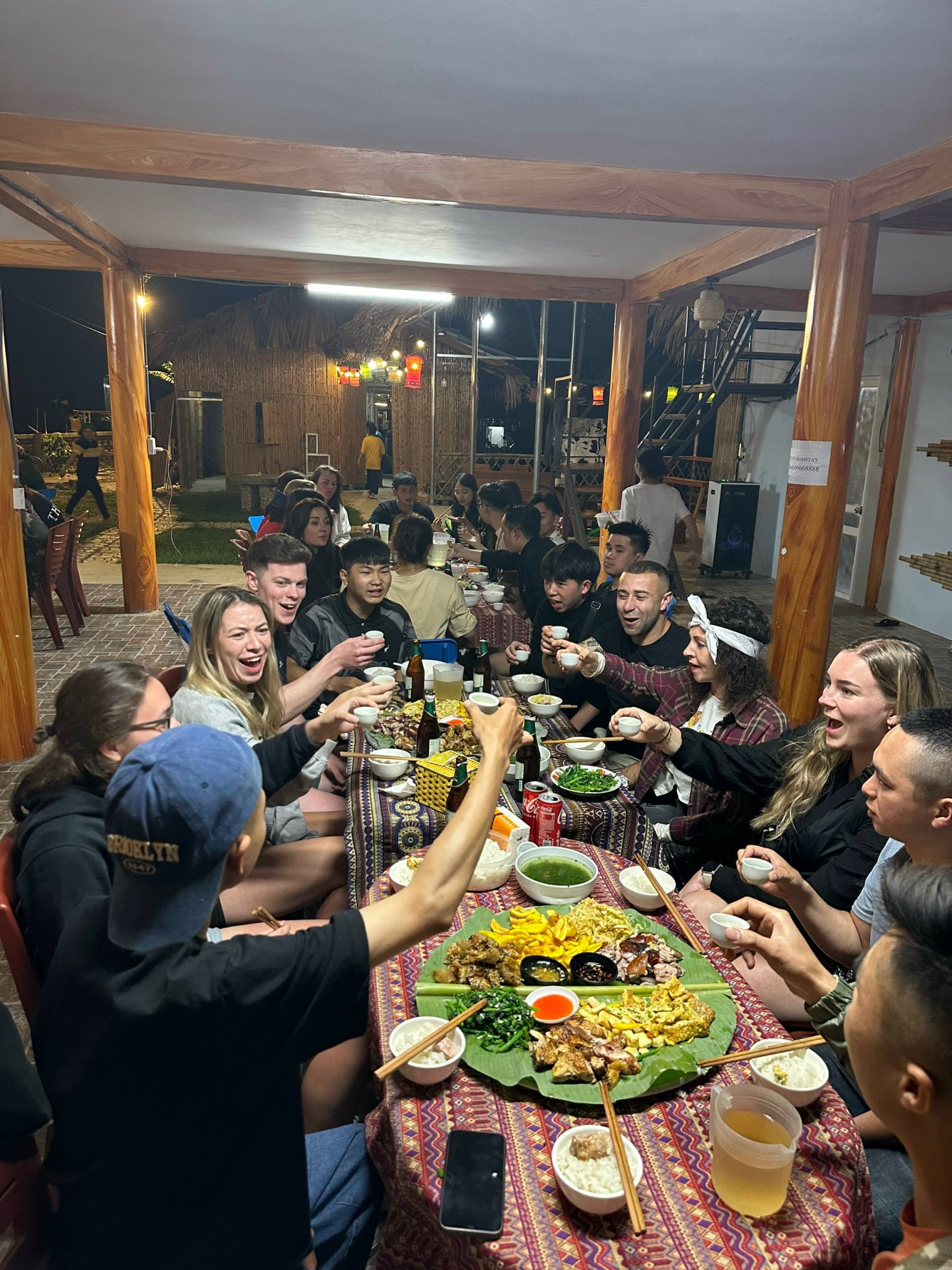 Ha Giang Vibes local team and travelers in Ha Giang
